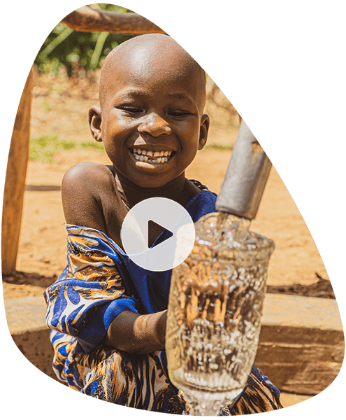 A young girl collects water in this video thumbnail.